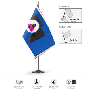 A mockup of the custom flag 'Wyoming flag' as a desk flag and small hand waving flag