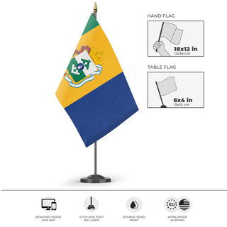 A mockup of the custom flag 'L'bania flag' as a desk flag and small hand waving flag