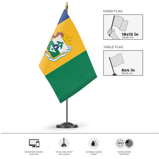 A mockup of the custom flag 'L'bania flag' as a desk flag and small hand waving flag