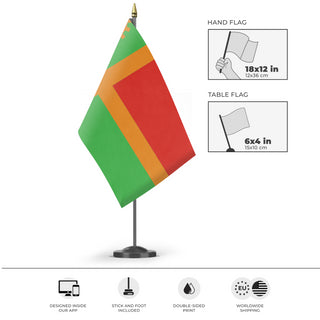 A mockup of the custom flag 'New Rearendia flag' as a desk flag and small hand waving flag
