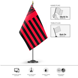 A mockup of the custom flag 'Albanian Heritage Flag' as a desk flag and small hand waving flag