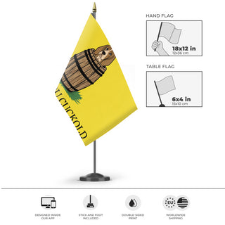 A mockup of the custom flag 'Come Out You Cuckold Gadsden flag' as a desk flag and small hand waving flag