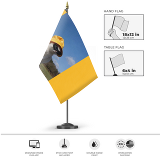 A mockup of the custom flag 'minimeow flag' as a desk flag and small hand waving flag