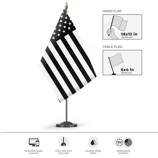 A mockup of the custom flag 'Black United States flag' as a desk flag and small hand waving flag