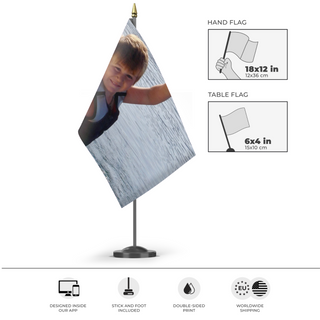 A mockup of the custom flag 'Design Studio flag' as a desk flag and small hand waving flag