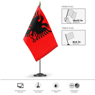 A mockup of the custom flag 'Albania High Contrast flag' as a desk flag and small hand waving flag