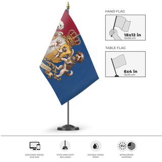 A mockup of the custom flag 'Family Dogs Heraldic flag' as a desk flag and small hand waving flag