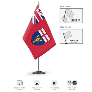 A mockup of the custom flag 'Flag of Canadian New Ireland' as a desk flag and small hand waving flag