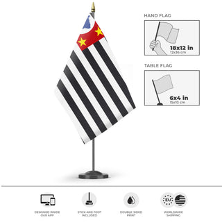 A mockup of the custom flag 'Flag of São Paulo' as a desk flag and small hand waving flag