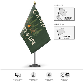 A mockup of the custom flag 'Grandparents Outdoors Flag' as a desk flag and small hand waving flag