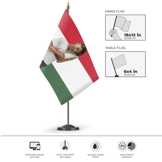 A mockup of the custom flag 'tuzaria flag' as a desk flag and small hand waving flag